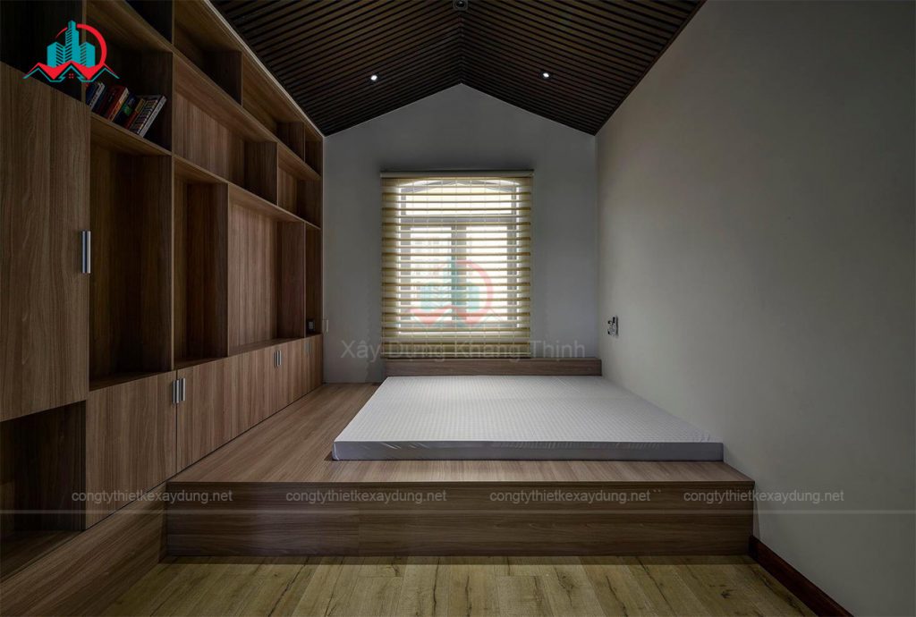 Nội thất phòng ngủ ấp mái có kệ sách đẹp - Công ty thiết kế xây dựng Khang Thịnh